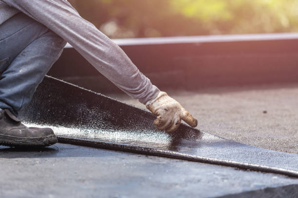 Professional Waterproofing technician working in Byron, MN